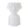Vaso a forma di busto di ragazzo in porcellana bianca, con decorazioni floreali sulla testa. Dimensioni: 20x15xh.28 cm.