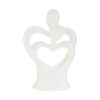 Statua in porcellana bianca raffigurante una coppia di sposi stilizzata con motivi a cuore, dimensioni 16x7xh.25 cm.