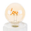 Lampada in porcellana bianca a LED con scritta "Love" arancione, dimensioni 10x18 cm, include shopper.