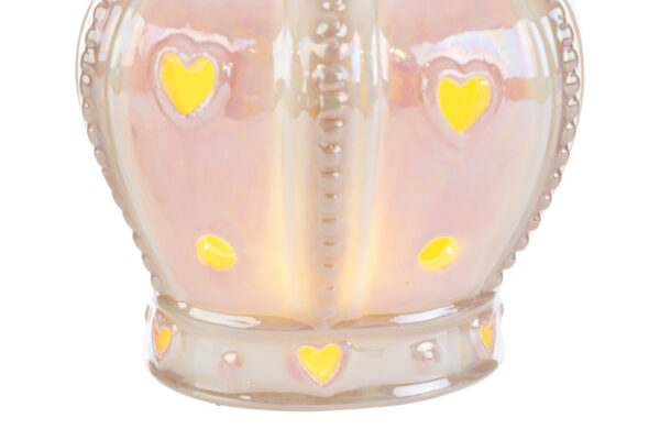 Corona in porcellana rosa con dettagli LED a forma di cuore, dimensioni 9x8x4,5 cm. Include shopper abbinata.