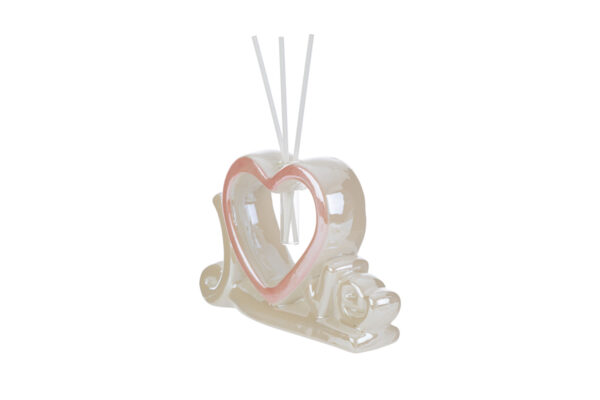 Profumatore a forma di cuore in porcellana bianca con dettagli rosa, dimensioni 16,5x4,5xh.11 cm, completo di astuccio elegante.