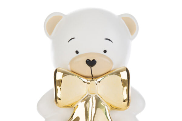 Carillon a forma di orsetto in porcellana bianca con fiocco dorato, 9xh.14 cm, elegante e grazioso, perfetto come regalo.