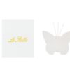 Profumatore a forma di farfalla in porcellana bianca con bastoncini, accanto ad astuccio bianco con scritta dorata "Le Stelle".