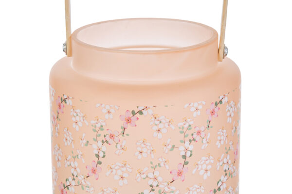 Lanterna in vetro color pesca con decorazioni floreali di magnolia, manico dorato; dimensioni d.12xh.17cm.