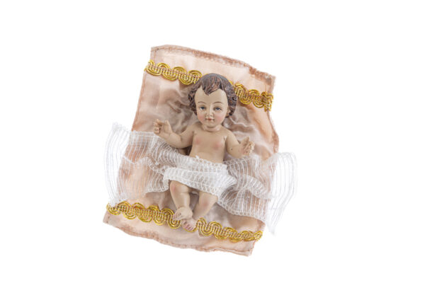 Bambino Gesù in resina vestita, sdraiato su panno decorato oro, parte del set Natività 23 cm.